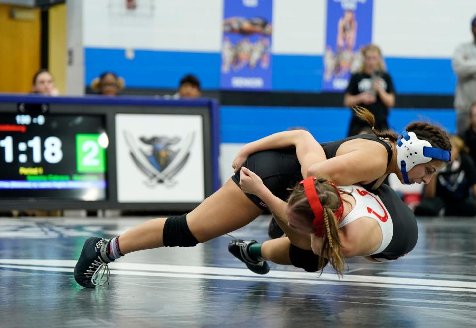 Matanzas' Saiomy Cabrera takes down Middleburg's Riley Toomer during the District 3-1A Tournament at Matanzas High School, Wednesday, Feb. 7, 2024.