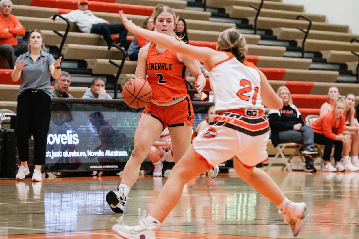 Ridgewood's Kya Masloski dribbles as Claymont's Abby Johnson guards during a game against, Thursday, Jan. 25 at Claymont High School.