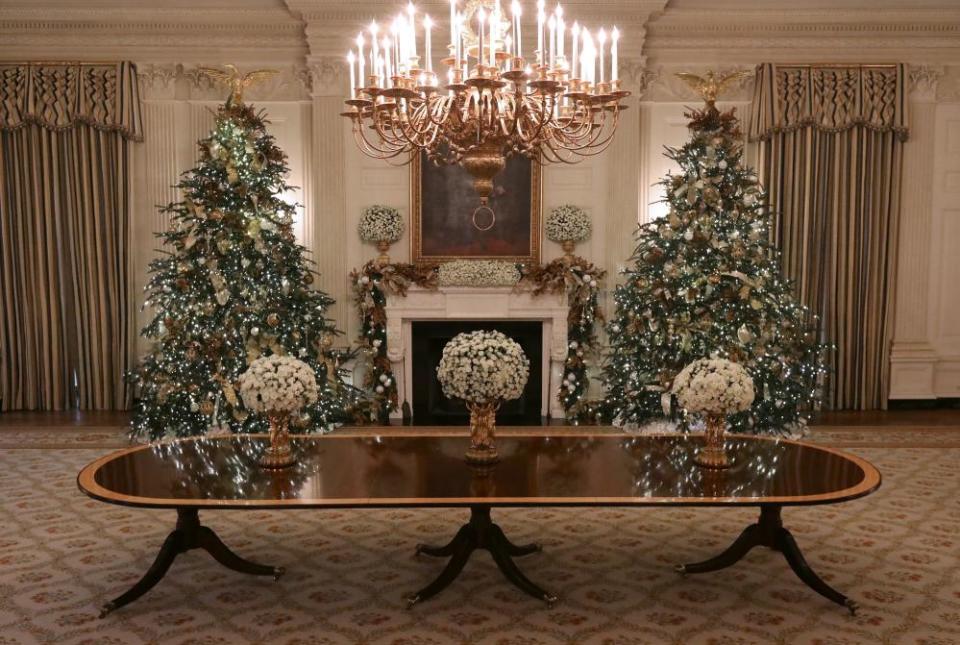 Michelle Obama made major upgrades to the State Dining Room, including the silk draperies with vertical stripes of blue and ecru.