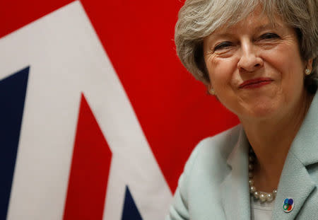 Britain's Prime Minister Theresa May attends a bilateral meeting during the Eastern Partnership summit at the European Council Headquarters in Brussels, Belgium November 24, 2017. REUTERS/Christian Hartmann/Files