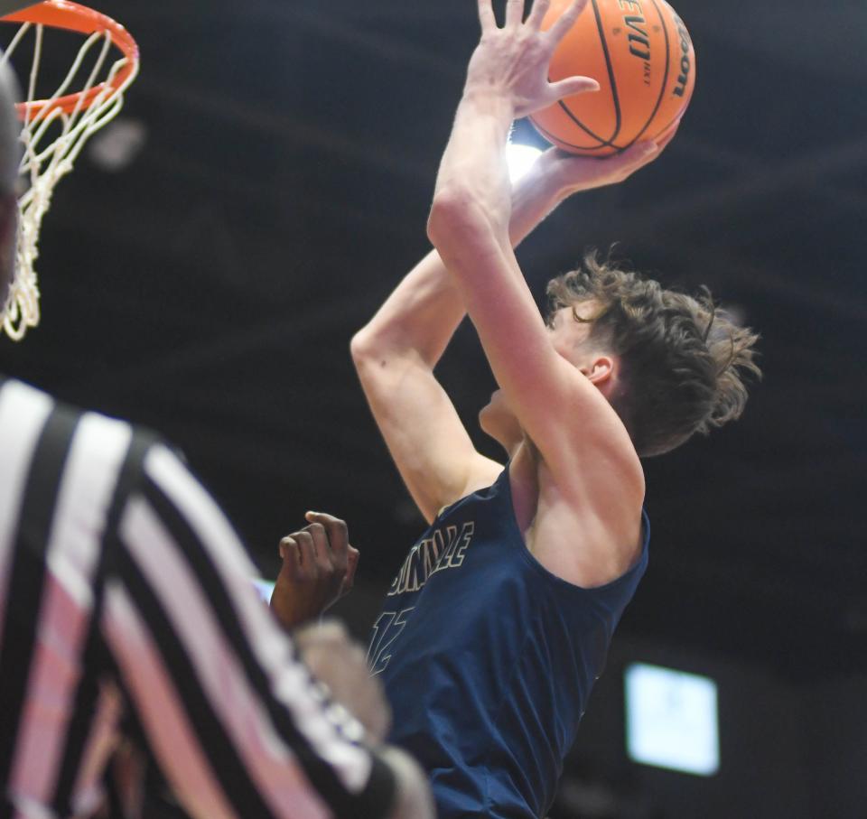 Jacksonville's Cade Phillips goes up for a shot against Handley during the Class 4A North Regional final at Pete Mathews Coliseum on Wednesday, Feb. 23, 2022 in Jacksonville, Alabama.