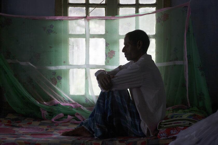 FILE- In this March 24, 2018 file photo, a tuberculosis patient sits on a bed at a TB hospital in Gauhati, India. The number of people killed by tuberculosis has risen for the first time in more than a decade, largely because fewer people got tested and treated as resources were diverted to fight the coronavirus pandemic, the World Health Organization said in a report released Thursday, Oct. 14, 2021. (AP Photo/Anupam Nath, File)