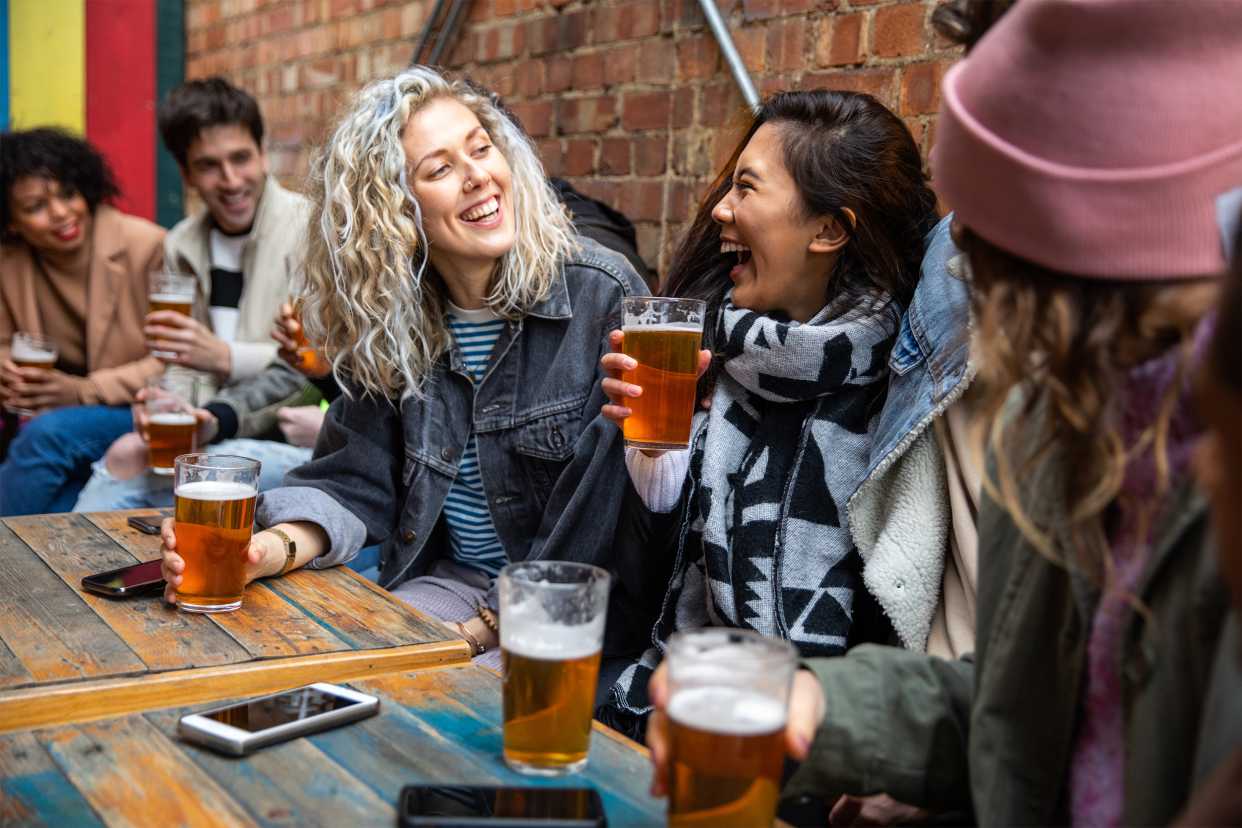 People drinking at a bar