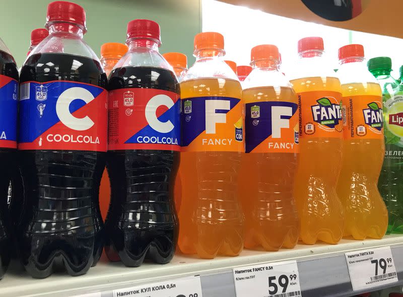 A view shows a shelf with bottles of soft drinks at a shop in Moscow