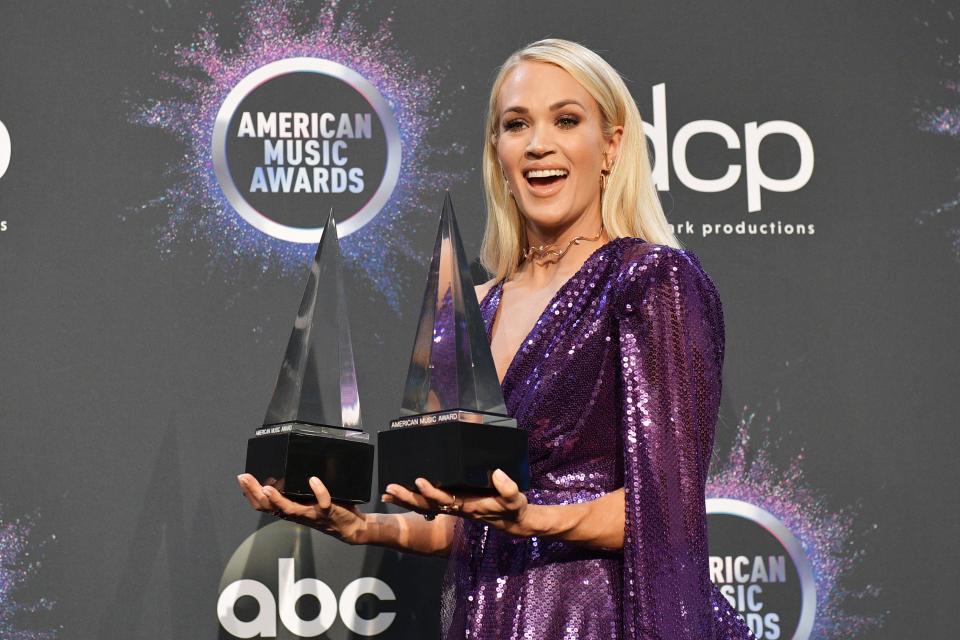 Carrie Underwood, winner of the favorite country album for 'Cry Pretty' and favorite female country artist, poses in the press room during the 2019 American Music Awards at Microsoft Theater on Nov. 24, 2019 in Los Angeles.