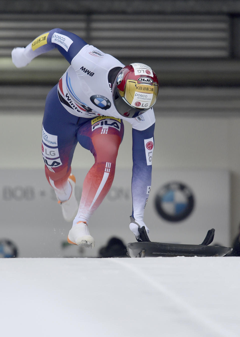 Yun Sung Bin from South Korea at the start of the ice channel in the first run of the men's Skeleton world cup in Winterberg, Germany, Sunday, Jan.5, 2019. (Caroline Seidel/dpa via AP)