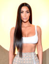 <p>She celebrated Balmain’s first Los Angeles boutique wearing long bone straight brunette hair – very similar to iconic singer Cher’s statement ‘do. (Photo: Getty) </p>