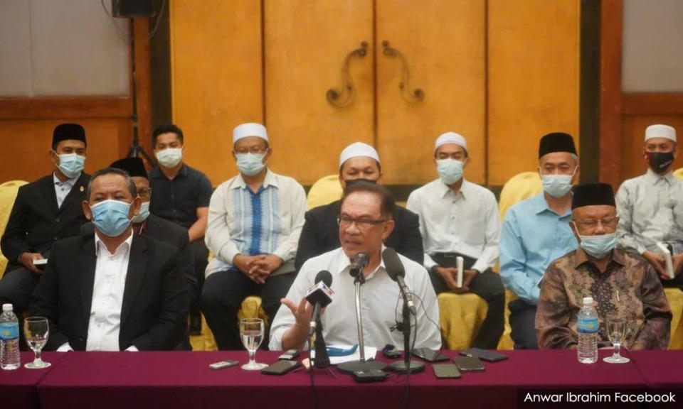 Opposition leader Anwar Ibrahim speaking at a press conference in Negeri Sembilan.