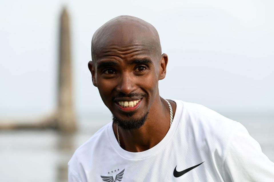 Mo Farah after crossing the finish line at the Antrim Coast Half Marathon 2020 (PA)