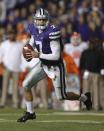 Quarterback Collin Klein #7 of the Kansas State Wildcats looks to pass against the Oklahoma State Cowboys in first quarter at Bill Snyder Family Football Stadium on November 3, 2012 in Manhattan, Kansas. (Photo by Ed Zurga/Getty Images)