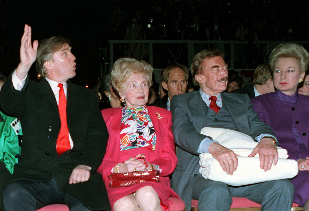 Donald Trump waves to staff members of the Trump Taj Mahal Casino Resort as they cheer him on before the start of the grand opening ceremonies in Atlantic City, N.J., in April 1990. Trump attended the gala with his mother, Mary; his father, Fred; and his sister Maryanne Trump Barry. (AP Photo/Charles Rex Arbogast)