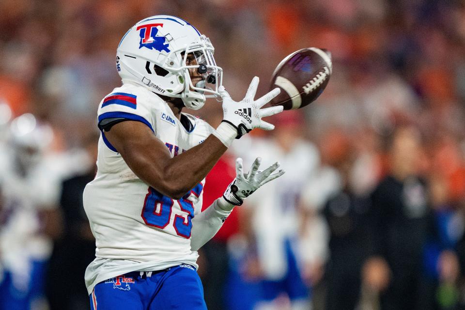 Louisiana Tech wide receiver Cyrus Allen makes a reception during the first half of the team's NCAA college football game against Clemson on Saturday, Sept. 17, 2022, in Clemson, S.C. (AP Photo/Jacob Kupferman)