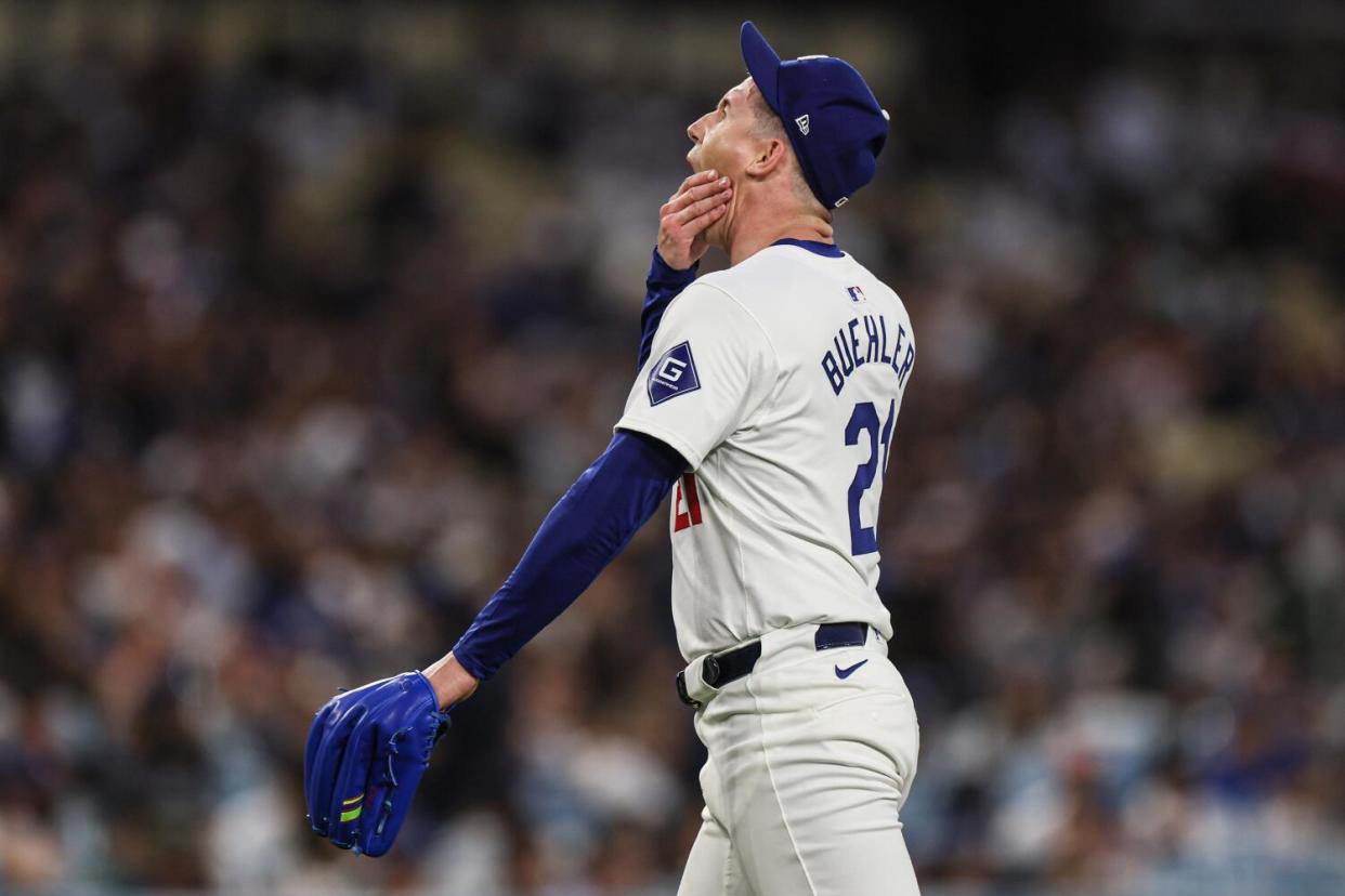 Dodgers pitcher Walker Buehler shows his frustration early on against the Miami Marlins on Monday.