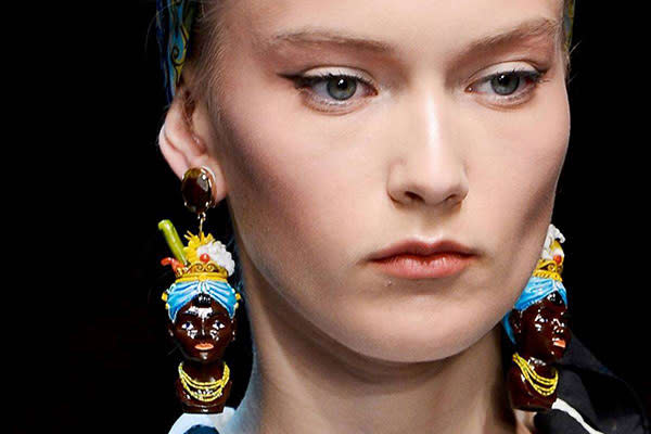 Dolce & Gabbana were criticised for showing Blackamoor-inspired earrings at their S/S 2013 show. “There wasn't a single black model in Dolce & Gabbana's show," said <i>The Guardian</i> UK fashion EA Sarah Ilyas, "and it's hard not to be appalled by the transparent exoticism in sending the only black faces down the runway in the form of earrings."