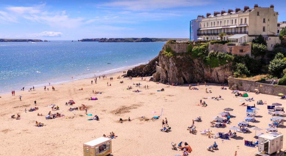 Sunscreen shouldn't just be reserved for when you go to beaches like Tenby in Wales (Getty)