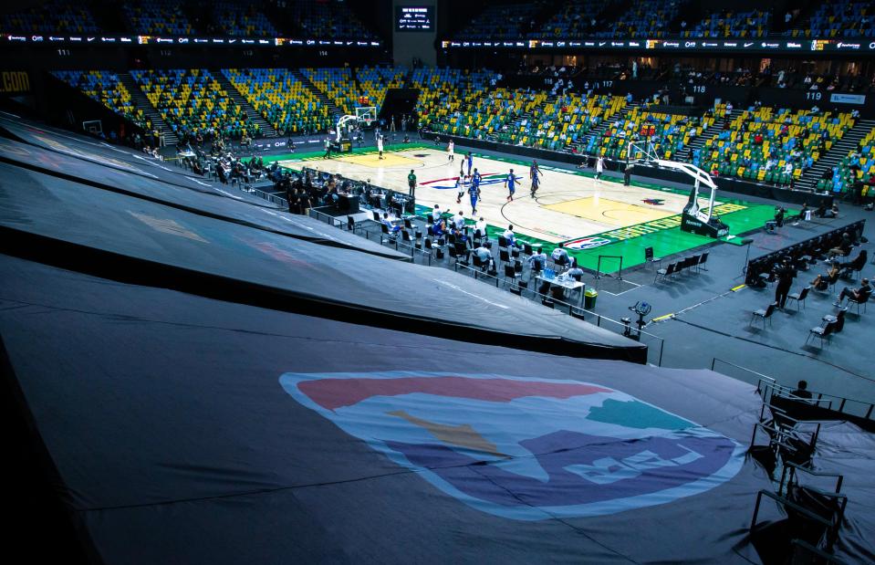Photo taken on May 16, 2021 shows a view of the opening game of the the inaugural Basketball Africa League BAL between Patriots of Rwanda and Rivers Hoopers of Nigeria in Kigali, capital city of Rwanda, May 16, 2021. The professional league, taking place at Kigali Arena from May 16-30 under strict COVID-19 guidelines, is a partnership between the International Basketball Federation FIBA and the National Basketball Association NBA that features 12 club teams from across Africa. It also marks the NBA's first collaboration to operate a league outside North America. (Photo by Cyril Ndegeya/Xinhua via Getty Images)