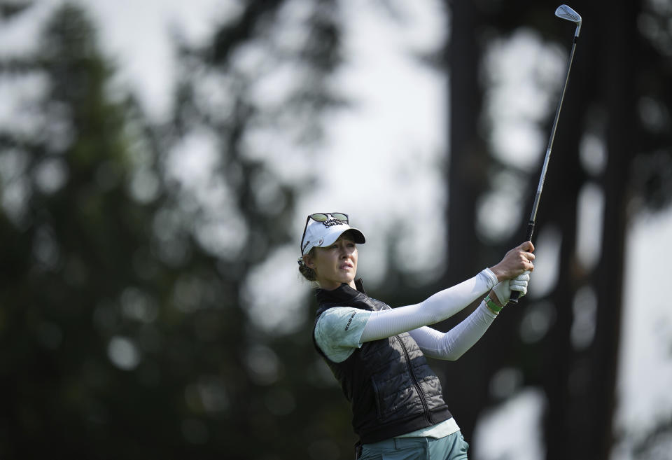 Nelly Korda watches her second shot on the 10th hole during the first round of the LPGA CPKC Women's Open golf tournament in Vancouver, British Columbia, Thursday, Aug. 24, 2023. (Darryl Dyck/The Canadian Press via AP)