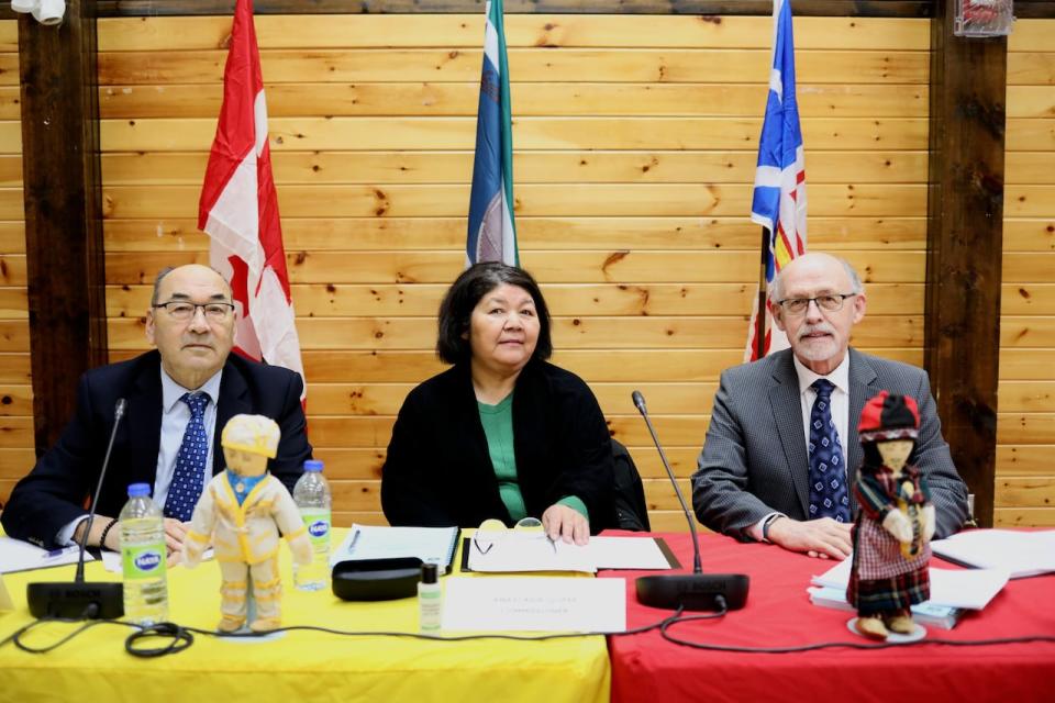 Commissioners James Igloliorte, Anastasia Qupee and Mike Devine at Monday's first formal hearings sessions of the Inquiry. 