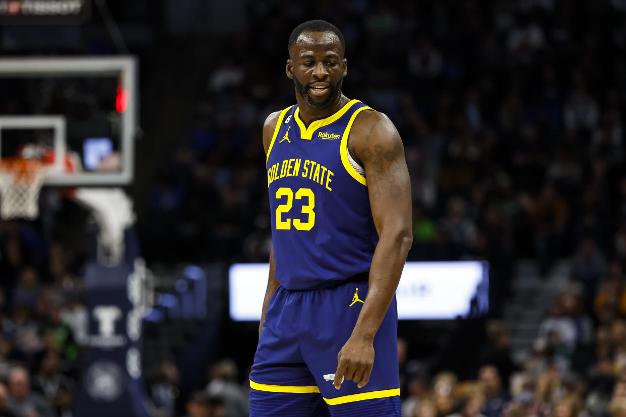 MINNEAPOLIS, MN - NOVEMBER 27: Draymond Green #23 of the Golden State Warriors looks on against the Minnesota Timberwolves in the first quarter of the game at Target Center on November 27, 2022 in Minneapolis, Minnesota. The Warriors defeated the Timberwolves 137-114. NOTE TO USER: User expressly acknowledges and agrees that, by downloading and or using this Photograph, user is consenting to the terms and conditions of the Getty Images License Agreement. (Photo by David Berding/Getty Images)