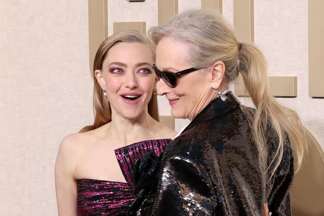<p>Monica Schipper/getty</p> 'Mamma Mia' stars Amanda Seyfried and Meryl Streep at the 2024 Golden Globes