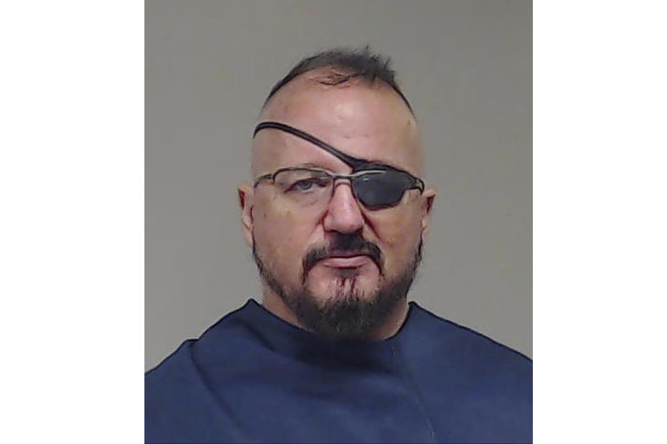 This photo, provided by the Collin County Sheriff's Office shows Stewart Rhodes. Prosecutors have filed seditious conspiracy charges on Thursday, Jan. 13, 2022, against Rhodes, the leader of the far-right Oath Keepers militia group and 10 suspected associates. More than 800 people across the U.S. have been charged in the Jan. 6 riot at the Capitol that left officers bloodied and sent lawmakers running in fear, and federal authorities continue to make new arrests practically every week (Collin County Sheriff's Office via AP)