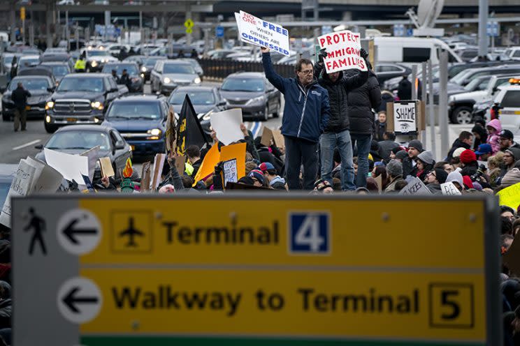 Protesters assemble at John F. Kennedy International Airport in New York, Saturday, Jan. 28, 2017 after two Iraqi refugees were detained while trying to enter the country. On Friday, Jan. 27, President Donald Trump signed an executive order suspending all immigration from countries with terrorism concerns for 90 days. Countries included in the ban are Iraq, Syria, Iran, Sudan, Libya, Somalia and Yemen, which are all Muslim-majority nations. (AP Photo/Craig Ruttle)