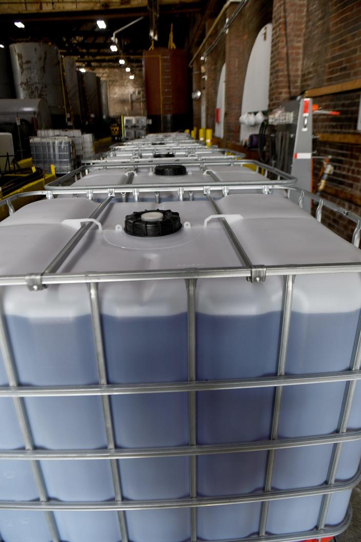 Containers filled with finished product at the Midwest Industrial Supply facility in downtown Canton.