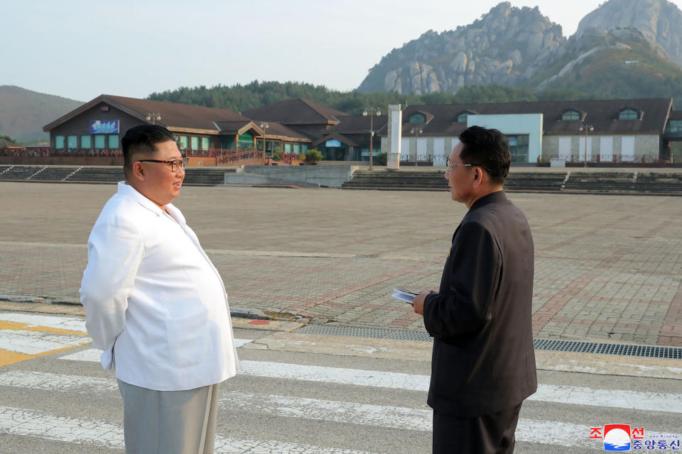 In this undated photo provided on Wednesday, Oct. 23, 2019, by the North Korean government, North Korean leader Kim Jong Un, left, visits the Diamond Mountain resort in Kumgang, North Korea. Kim ordered the destruction of South Korean-made hotels and other tourist facilities at the North's Diamond Mountain resort, apparently because Seoul won't defy international sanctions and resume South Korean tours at the site, Pyongyang's official Korean Central News Agency said Wednesday. Independent journalists were not given access to cover the event depicted in this image distributed by the North Korean government. The content of this image is as provided and cannot be independently verified. Korean language watermark on image as provided by source reads: "KCNA" which is the abbreviation for Korean Central News Agency. (Korean Central News Agency/Korea News Service via AP)