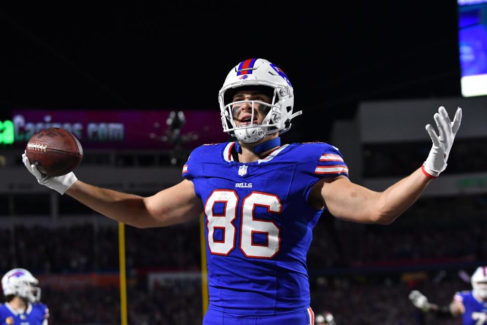 Buffalo Bills tight end Dalton Kincaid celebrates scoring a touchdown against the Tampa Bay Buccaneers in the second quarter at Highmark Stadium.