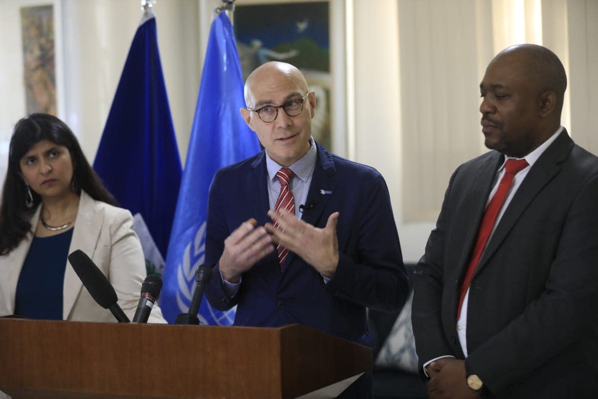United Nations High Commissioner for Human Rights Volker Türk, center, gives a press conference in Port-au-Prince, Haiti, Friday, Feb. 10, 2023. (AP Photo/Odelyn Joseph)