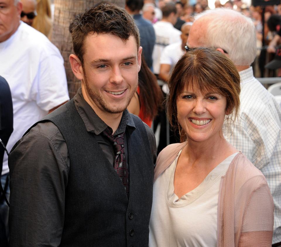 Pam Dawber and son participate in the Mark Harmon star ceremony on the Hollywood Walk of Fame on October 1, 2012 in Hollywood, California