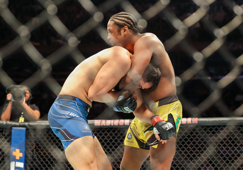 Nov 12, 2022; New York, NY, USA; Dominick Reyes (red gloves) and Ryan Spann (blue gloves) during UFC 281 at Madison Square Garden. Mandatory Credit: Jessica Alcheh-USA TODAY Sports