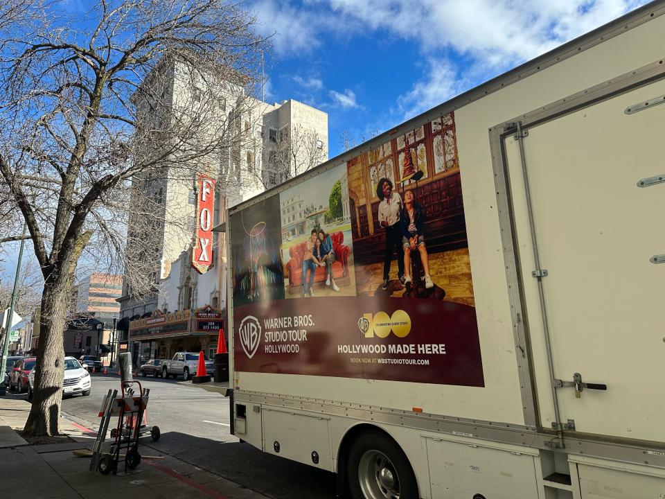 A Warner Bros. van sits in front of the Bob Hope Theatre in downtown Stockton on Monday, Feb. 5, 2024.