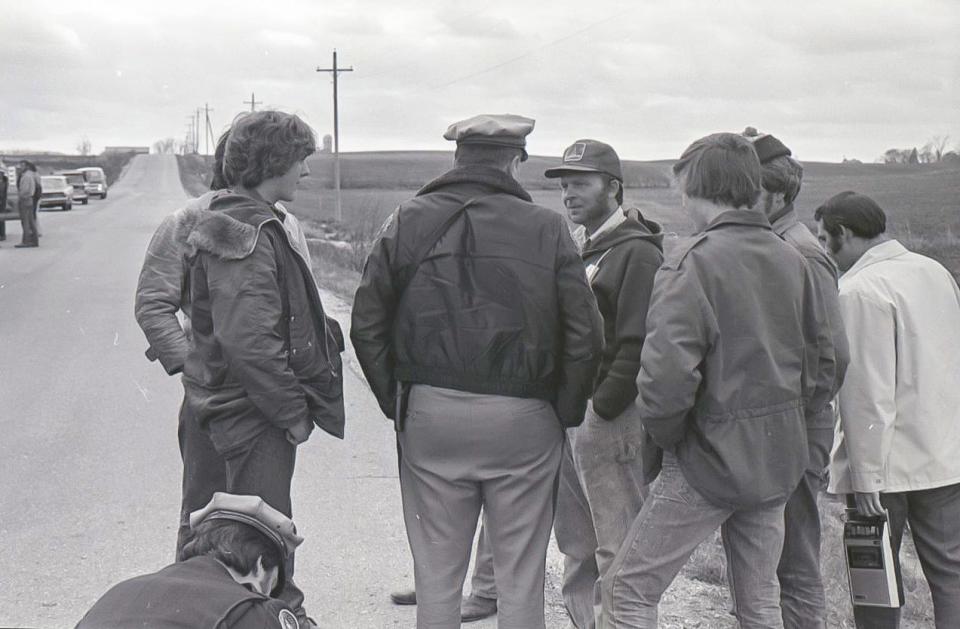 FILE- Interstate construction protesters talk to an officer in this May 1976 photo.