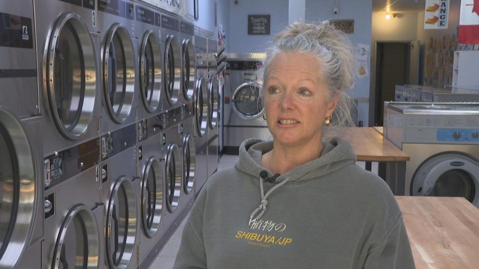 Wanda Short, owner of Grosvenor Coin Laundry in St. Albert, stopped operations Monday and said she hopes the ban won't last long.