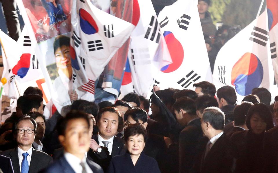 South Korea's ousted leader Park Geun-hye greets her supporters in Seoul in March. - Credit: REUTERS/Kim Kyung-Hoon