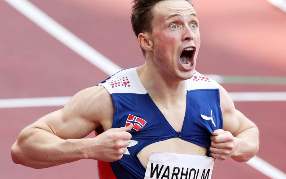 Karsten Warholm of Team Norway reacts after winning the gold medal in the Men's 400m Hurdles Final on day eleven of the Tokyo 2020 Olympic Games at Olympic Stadium on August 03, 2021 in Tokyo - GETTY IMAGES