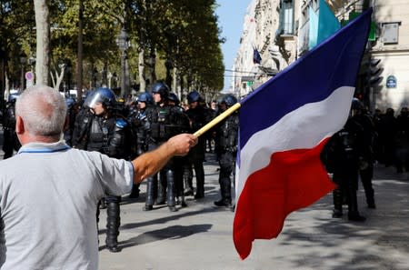 Protesters attend a demonstration on Act 45 (the 45th consecutive national protest on Saturday) of the yellow vests movement in Paris