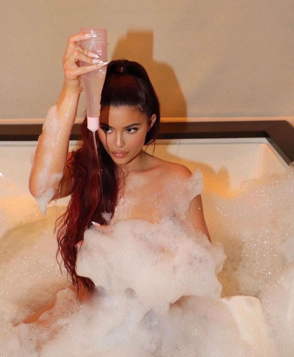 Kylie Jenner, 23, has stripped off for a sultry bathtub snap to flog her new bubble bath product. Photo: Instagram/kyliecosmetics.