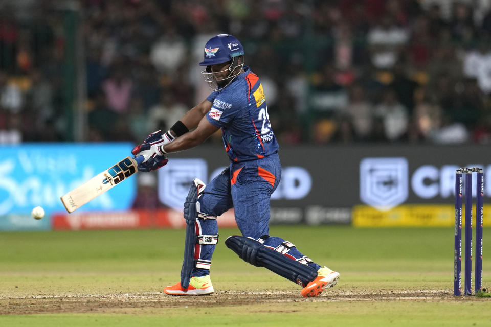 Lucknow Super Giants' Nicholas Pooran plays a shot during the Indian Premier League cricket match between Royal Challengers Bangalore and Lucknow Super Giants in Bengaluru, India, Monday, April 10, 2023. (AP Photo/Aijaz Rahi)