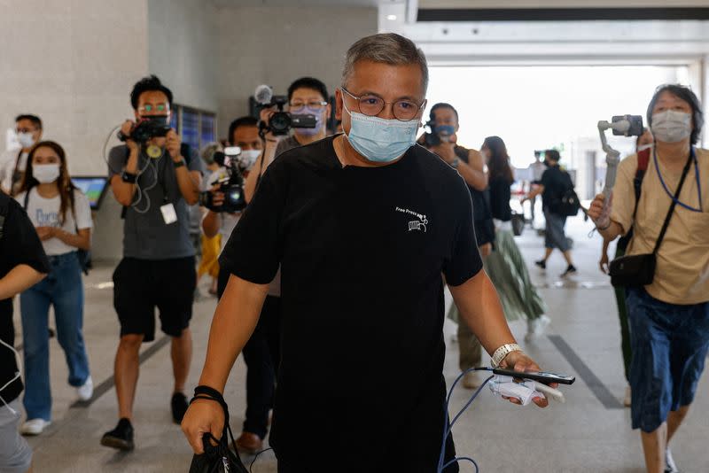 Ronson Chan, chairman of the Hong Kong Journalists Association (HKJA) arrives the West Kowloon Magistrates Courts after been charged with obstructing police in Hong Kong,
