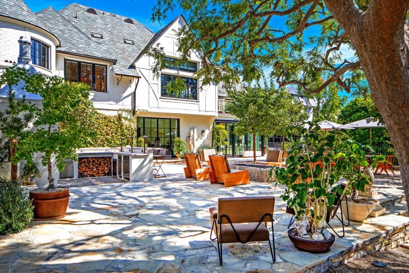 Ellen DeGeneres asks $53.5 million for Beverly Hills home with star-studded past -- Once owned by tennis star Pete Sampras and Maroon 5's Adam Levine, the ivy-draped traditional spans 10,400 square feet with guesthouse, swimming pool and tennis court. (Anthony Barcelo)