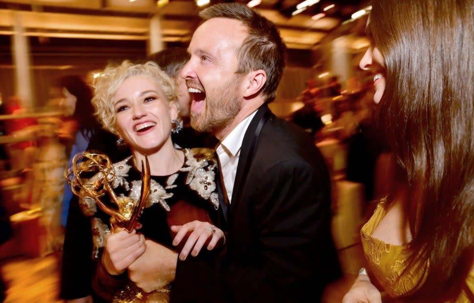 Julia Garner and Aaron Paul