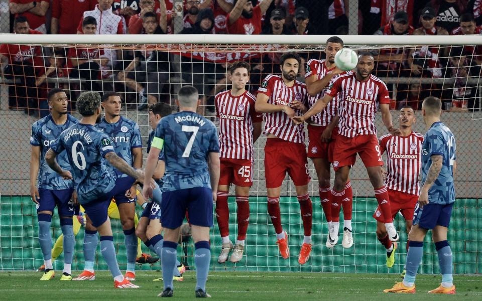 Douglas Luiz shoots from a free-kick