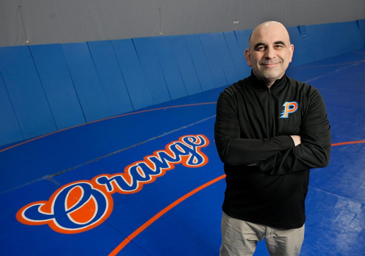 Olentangy Orange's Brian Nicola is The Dispatch's All-Metro Girls Wrestling Coach of the Year.