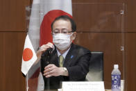 Japanese Foreign Ministry's Director-General of the Asian and Oceanian Affairs Bureau Takehiro Funakoshi prepares to speak during a trilateral meeting with U.S. Special Representative for North Korea, Sung Kim, and South Korea's Special Representative for Korean Peninsula Peace and Security Affairs Noh Kyu-duk on North Korean issue at Foreign Ministry Tuesday, Sept. 14, 2021 n Tokyo. (AP Photo/Eugene Hoshiko)