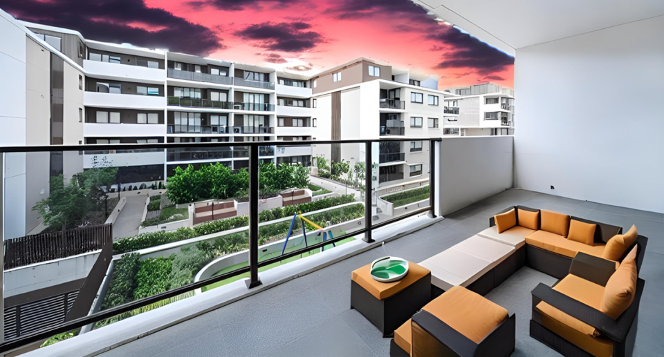 A balcony image with a photoshopped sunset and full furniture set appearing to look to a smaller scale was included in a Sydney real estate advertisement. 