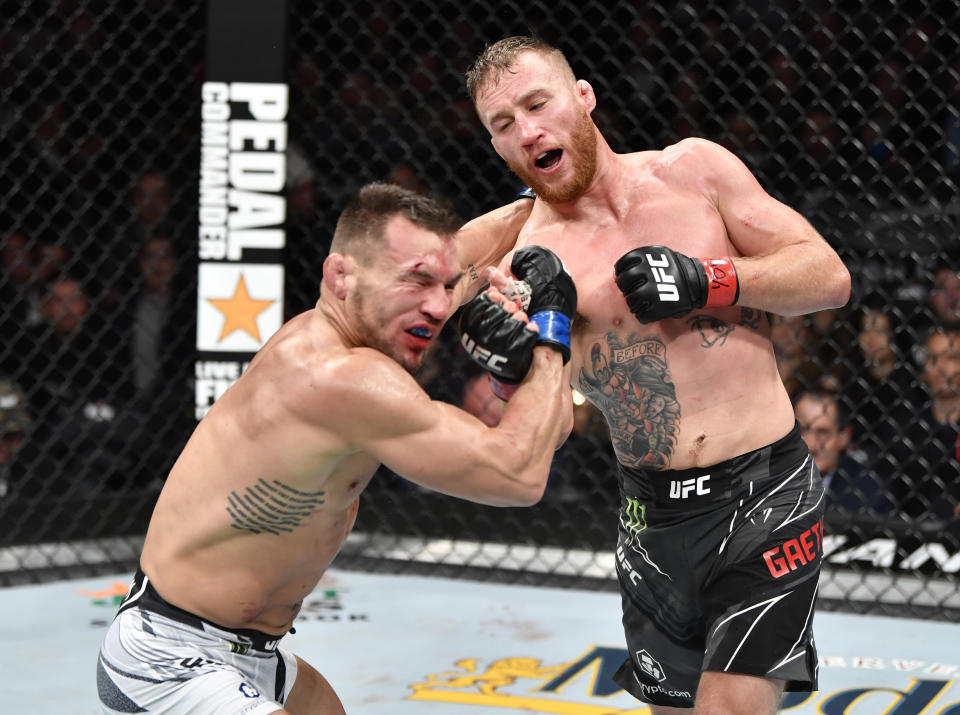 NEW YORK, NEW YORK - NOVEMBER 06: (R-L) Justin Gaethje punches Michael Chandler in their lightweight fight during the UFC 268 event at Madison Square Garden on November 06, 2021 in New York City. (Photo by Jeff Bottari/Zuffa LLC)