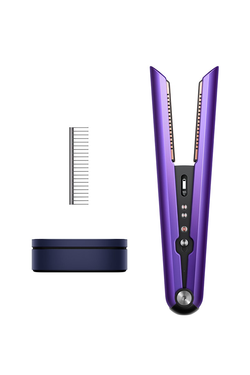 A purple dyson hair straightener with small silver comb head and black storage box.