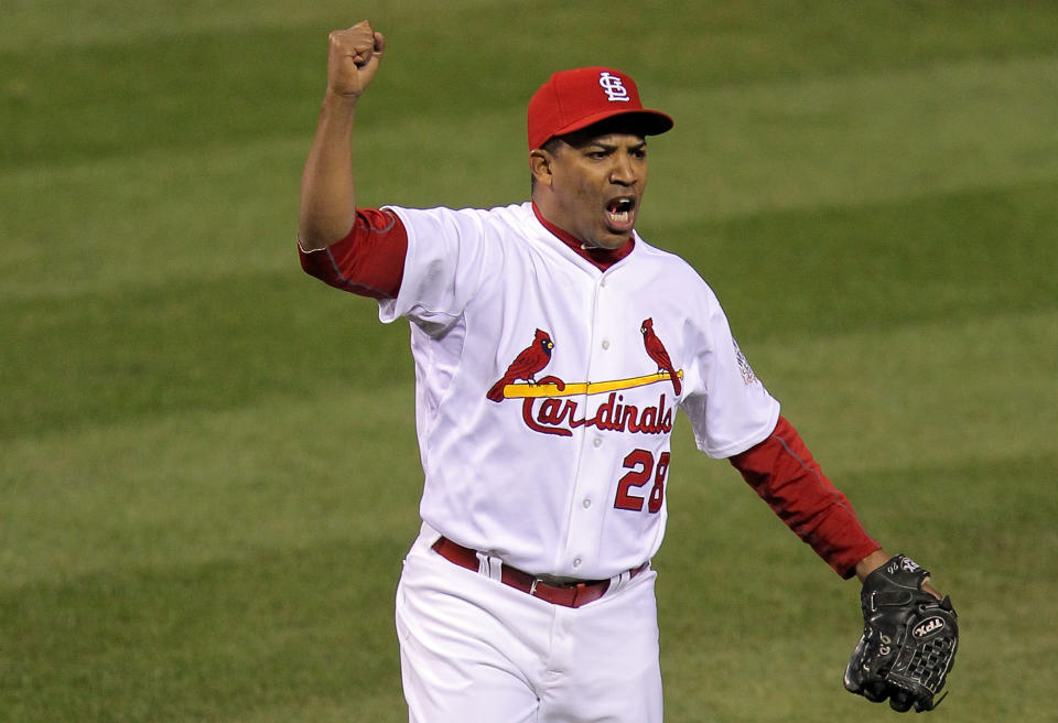 ST LOUIS, MO - OCTOBER 28: Octavio Dotel #28 of the St. Louis Cardinals celebrates after getting the third out of the seventh inning during Game Seven of the MLB World Series against the Texas Rangers at Busch Stadium on October 28, 2011 in St Louis, Missouri. (Photo by Doug Pensinger/Getty Images)